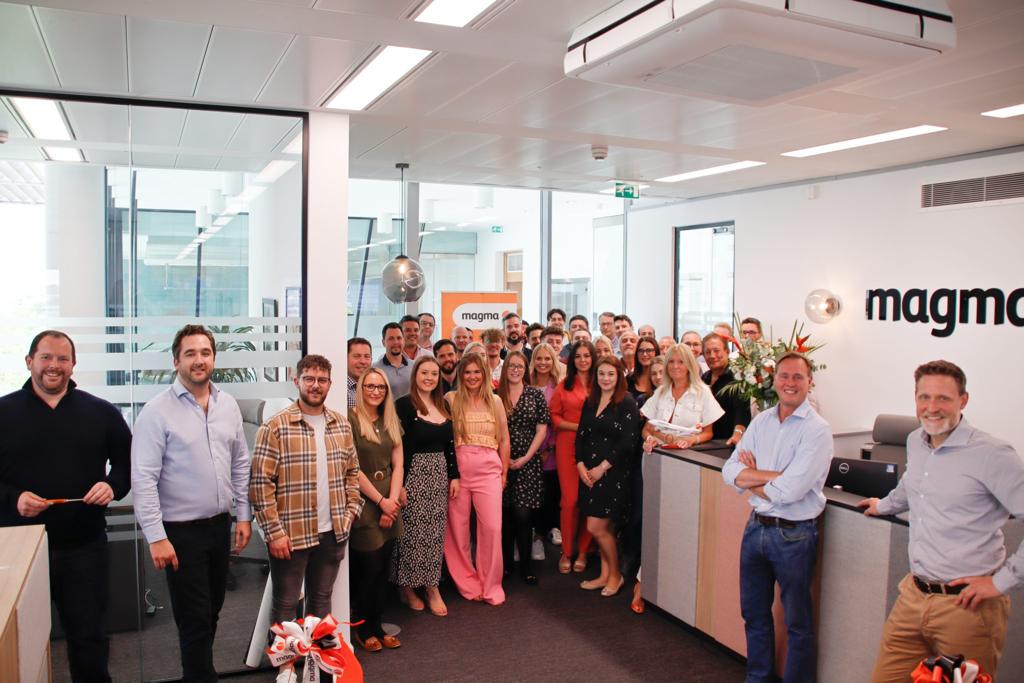 Staff celebrates opening of Magma Aviation's new office space