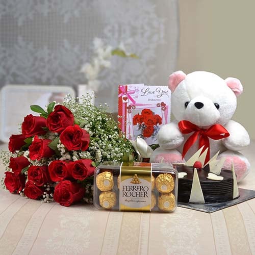 12 Red Roses & Teddy With Ferrero Rocher & Half Kg Chocolate Cake