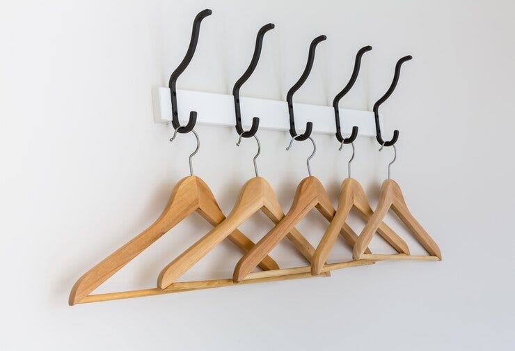 10 Ideas for Decorating with Wooden Hangers | by Hangersworld | Jul, 2024 | Medium