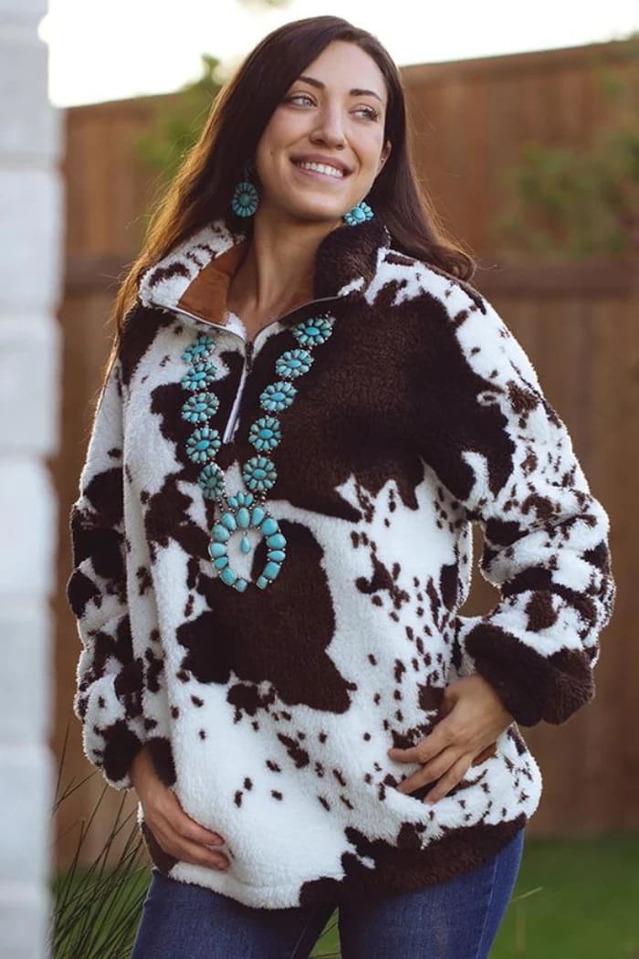Layer Up in Style: The Cow Print Coat You Need This Season
