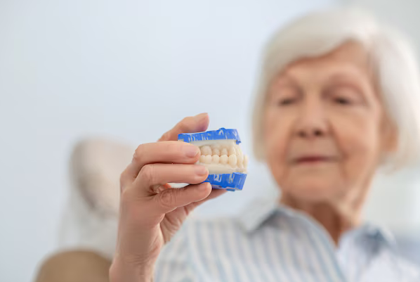 The Benefits of Implant Dentures for a Permanent Smile